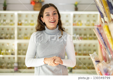 Nice girl, an employee of perfume shop, invites you to go shopping Nice girl, an employee of perfume shop, invites you to go shopping 130349799