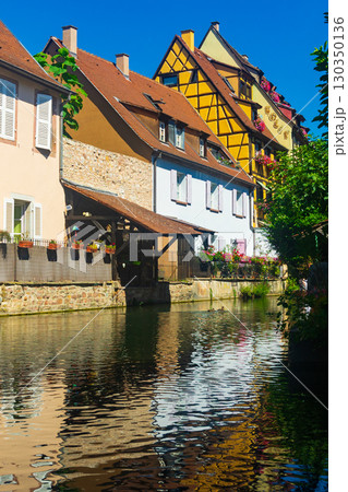 Summer view of Little Venice quarter in Colmar on banks of canal, France 130350136
