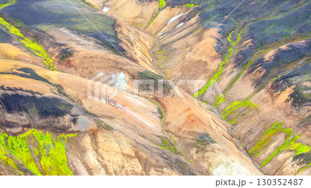 Unique geological formations in Iceland showcasing vibrant colors and diverse landscapes Unique geological formations in Iceland showcasing vibrant colors and diverse landscapes 130352487
