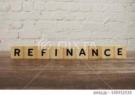 Refinance word alphabet letters on wooden background Refinance word alphabet letters on wooden background 130352539