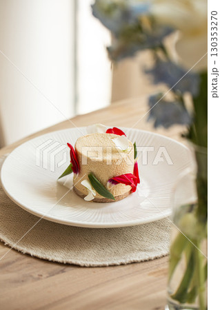 Elegant mousse dessert with flower petals Elegant mousse dessert with flower petals 130353270