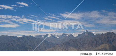 Mountain peaks of the Zanskar Range seen from Leh Palace, India. 130356968