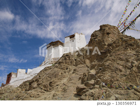 Tsemo Castle like an eagles nest enthroned above Leh and prayer flags, India. Tsemo Castle like an eagles nest enthroned above Leh and prayer flags, India. 130356971