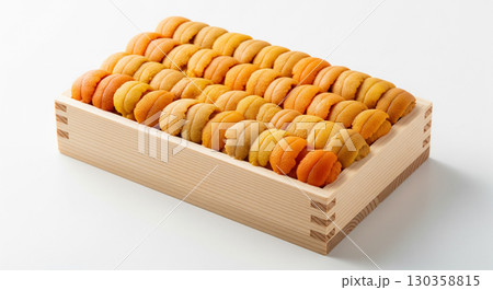 A Traditional Wooden Box of Fresh Sea Urchin Roe Uni on a White Background 130358815