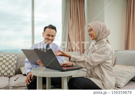 A Professional Business Meeting In A Contemporary Office Environment With Collaboration 130359079