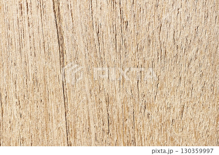 Closeup view of the intricate grain pattern of rustic hardwood surface. Wood texture background Closeup view of the intricate grain pattern of rustic hardwood surface. Wood texture background 130359997