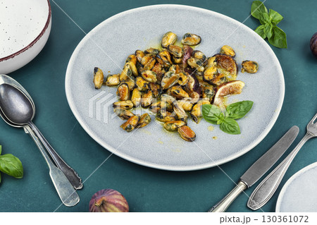 Delicious fried peeled mussels with figs Delicious fried peeled mussels with figs 130361072