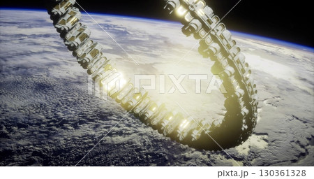 A futuristic habitat ring orbits Earth against a backdrop of clouds and blue atmosphere. The structure shines with bright lights, highlighting innovative design in space living. A futuristic habitat ring orbits Earth against a backdrop of clouds and blue atmosphere. The structure shines with bright lights, highlighting innovative design in space living. 130361328