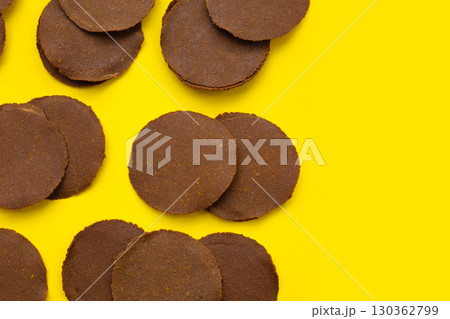 Fermented soybean discs, known as Thua Nao a traditional Thai seasoning used to enhance flavor in Northern cuisine. 130362799