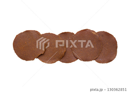 Fermented soybean discs, known as Thua Nao a traditional Thai seasoning used to enhance flavor in Northern cuisine. 130362851