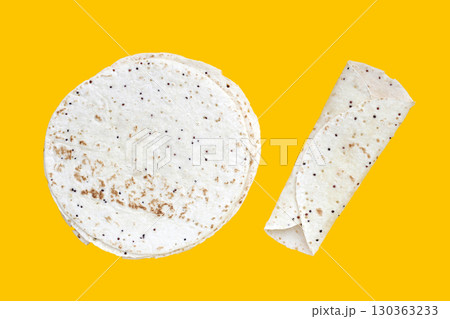 Quinoa tortilla wraps on yellow background 130363233