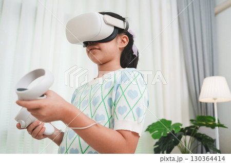 Young Girl Exploring Virtual Reality for STEM Education 130364414