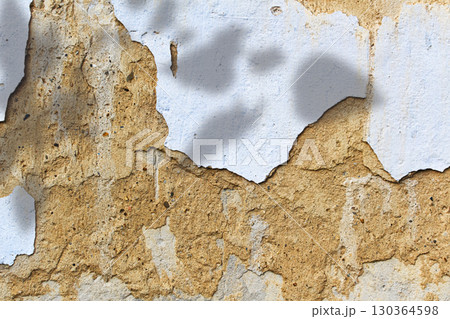 Old grunge and crack yellow wall and shadows. Background with copy space 130364598