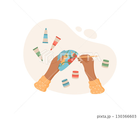 Hands create colorful art using various tools in a craft activity. Engaging DIY project for children and adults. Concept of creativity, fun, and artistic expression. 130366603