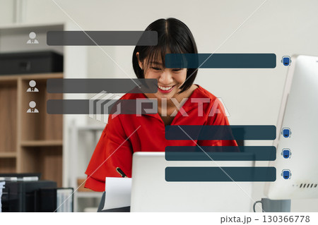 Businesswoman uses artificial intelligence chatbots automatically respond online messages to help customers instantly. Businesswoman uses artificial intelligence chatbots automatically respond online messages to help customers instantly. 130366778