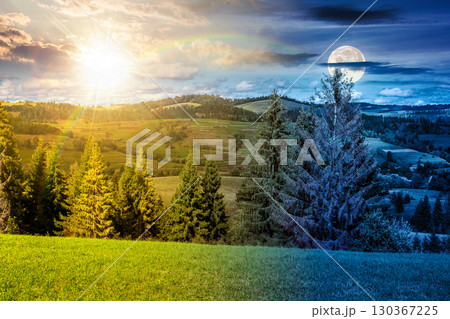 mountainous carpathian countryside landscape. day and night time change. scenic rural valley. grassy alpine meadow with sun and moon at twilight. forest on hill. vacation in highland on autumn equinox mountainous carpathian countryside landscape. day and night time change. scenic rural valley. grassy alpine meadow with sun and moon at twilight. forest on hill. vacation in highland on autumn equinox 130367225