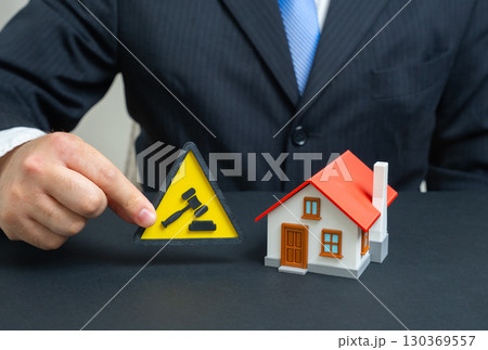 Real estate litigation. Housing seizure pending court verdict. Mortgage disputes, property rights protection, legal conflicts, banking foreclosure, housing market instability, financial justice 130369557