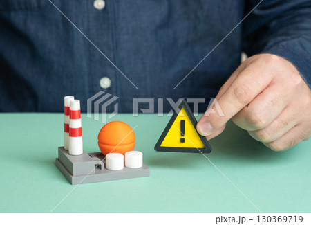 Power plant and warning sign, accident risk, energy crisis, infrastructure problems, safety issues, urgent modernization need Power plant and warning sign, accident risk, energy crisis, infrastructure problems, safety issues, urgent modernization need 130369719