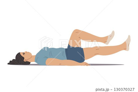 Woman doing bicycle crunch exercise on floor 130370327