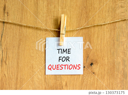 Time for questions symbol. Concept words Time for questions on beautiful white paper on clothespin. Beautiful wooden background. Business time for questions concept. Copy space. 130373175
