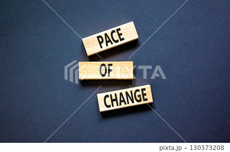 Pace of change symbol. Concept words Pace of change on beautiful wooden blocks. Beautiful black table black background. Business pace of change concept. Copy space. 130373208