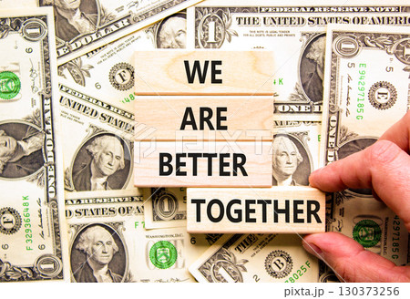 We are better together symbol. Concept words phrase We are better together on beautiful blocks. Dollar bills. Beautiful dollar bills background. Business We are better together concept. Copy space We are better together symbol. Concept words phrase We are better together on beautiful blocks. Dollar bills. Beautiful dollar bills background. Business We are better together concept. Copy space 130373256