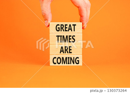 Great times are coming symbol. Concept words Great times are coming on beautiful wooden blocks. Beautiful orange table orange background. Business great times are coming concept. Copy space. Great times are coming symbol. Concept words Great times are coming on beautiful wooden blocks. Beautiful orange table orange background. Business great times are coming concept. Copy space. 130373264