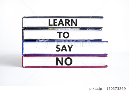 Learn to say no symbol. Concept words phrase Learn to say no on beautiful books. Beautiful white paper background. Business psychological Learn to say no concept. Copy space. Learn to say no symbol. Concept words phrase Learn to say no on beautiful books. Beautiful white paper background. Business psychological Learn to say no concept. Copy space. 130373269