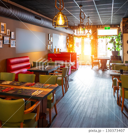 Natural restaurant interior with scenic view at sunset 130373407