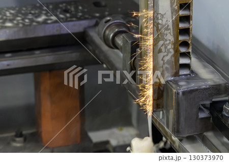Closeup scene the wire EDM machine cutting the mold insert parts. 130373970