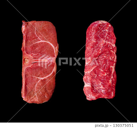 Comparison of two cuts of beef showcasing texture and marbling details Comparison of two cuts of beef showcasing texture and marbling details 130375051