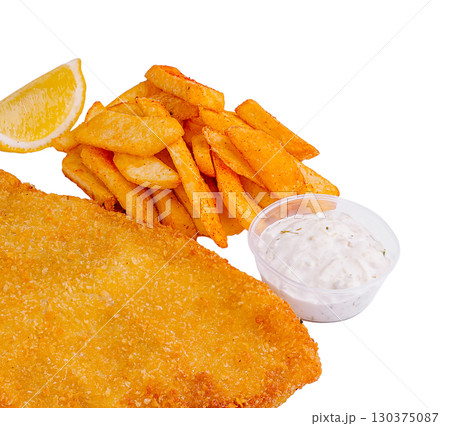 Crispy fried schnitzel with seasoned fries and dipping sauce ready for lunch Crispy fried schnitzel with seasoned fries and dipping sauce ready for lunch 130375087