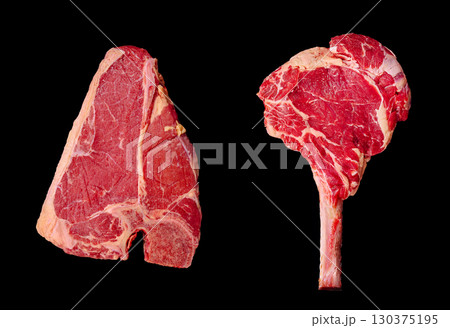 Different cuts of beef displayed on a black background for culinary comparison 130375195