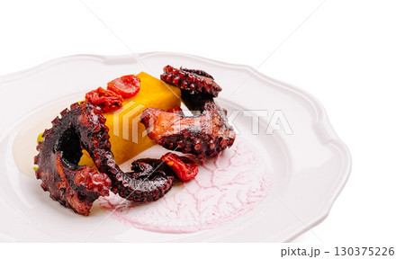 Octopus with polenta and sun-dried tomatoes served in modern presentation Octopus with polenta and sun-dried tomatoes served in modern presentation 130375226