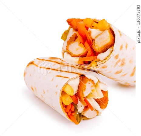 Delicious wraps filled with crispy chicken and fresh vegetables 130375293
