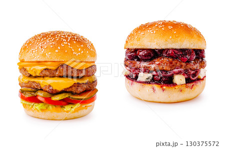 Two distinct burgers showcasing creative flavor combinations and textures Two distinct burgers showcasing creative flavor combinations and textures 130375572