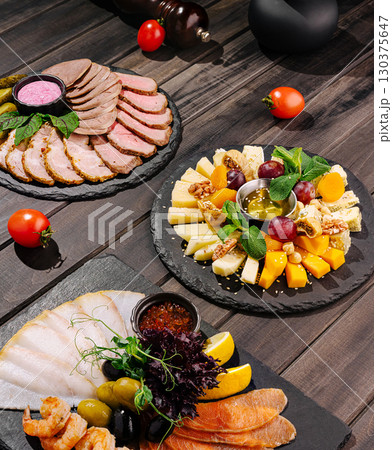 Gourmet platter of meats and cheeses for your festive gathering 130375647