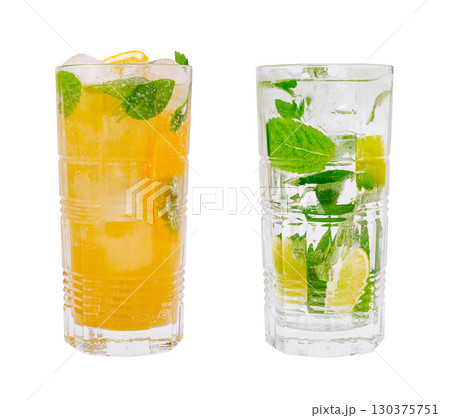 Refreshing summer beverages with mint and citrus in clear glasses 130375751