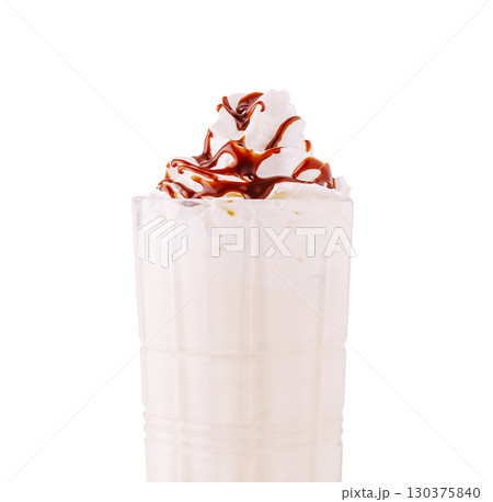 Creamy dessert drink with whipped cream and chocolate drizzle in a glass Creamy dessert drink with whipped cream and chocolate drizzle in a glass 130375840