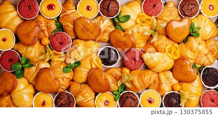 Delicious assortment of pastries displayed for a festive gathering 130375855