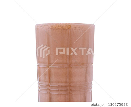 Creamy chocolate drink served in a tall glass with frothy top 130375938