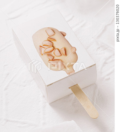 Creamy frozen dessert in a cute packaging with a wooden stick Creamy frozen dessert in a cute packaging with a wooden stick 130376020