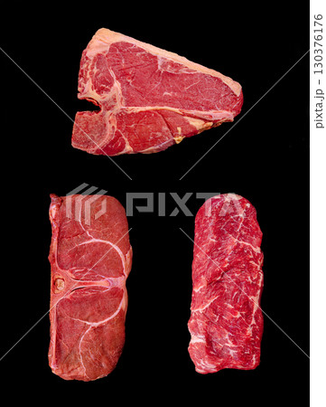 Different cuts of beef displayed on a black background for culinary perspective Different cuts of beef displayed on a black background for culinary perspective 130376176