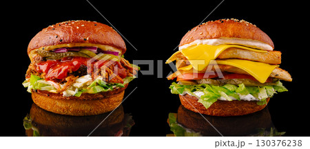 Delicious sandwich selection showcasing pulled meat and cheesy toppings 130376238