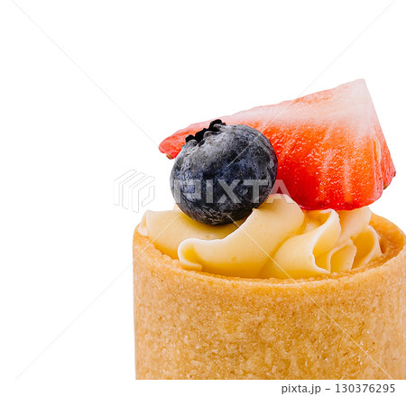Delicious dessert with fresh fruits served in a pastry shell at a cafe 130376295