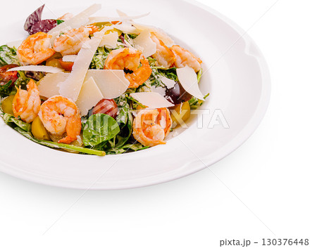 Fresh shrimp salad with spinach, tomatoes, and parmesan cheese served for lunch Fresh shrimp salad with spinach, tomatoes, and parmesan cheese served for lunch 130376448