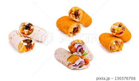 Delicious wraps featuring fresh ingredients displayed on a white surface Delicious wraps featuring fresh ingredients displayed on a white surface 130376708