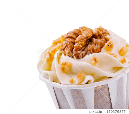 Delicious cupcake topped with a walnut, perfect for any dessert Delicious cupcake topped with a walnut, perfect for any dessert 130376875