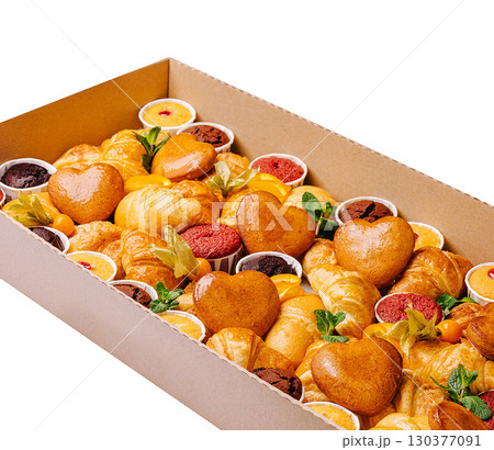 Delicious assortment of baked goods in creative arrangement for celebration Delicious assortment of baked goods in creative arrangement for celebration 130377091