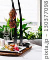Gourmet dining experience with grilled meat and wine indoors 130377098